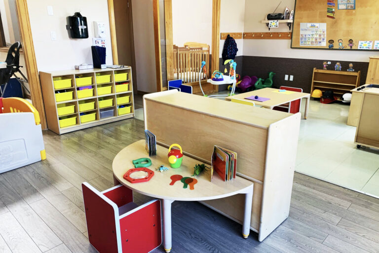 interior of room with tables and toys
