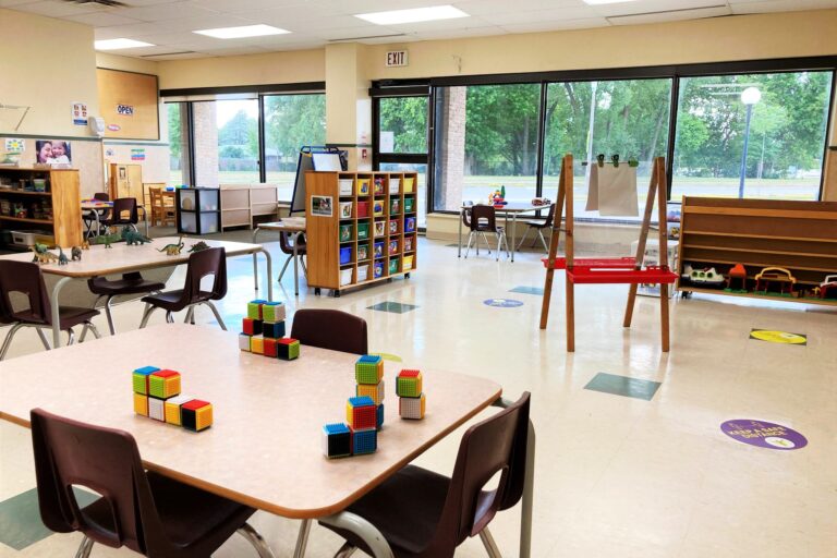 preschool room with tables and chairs