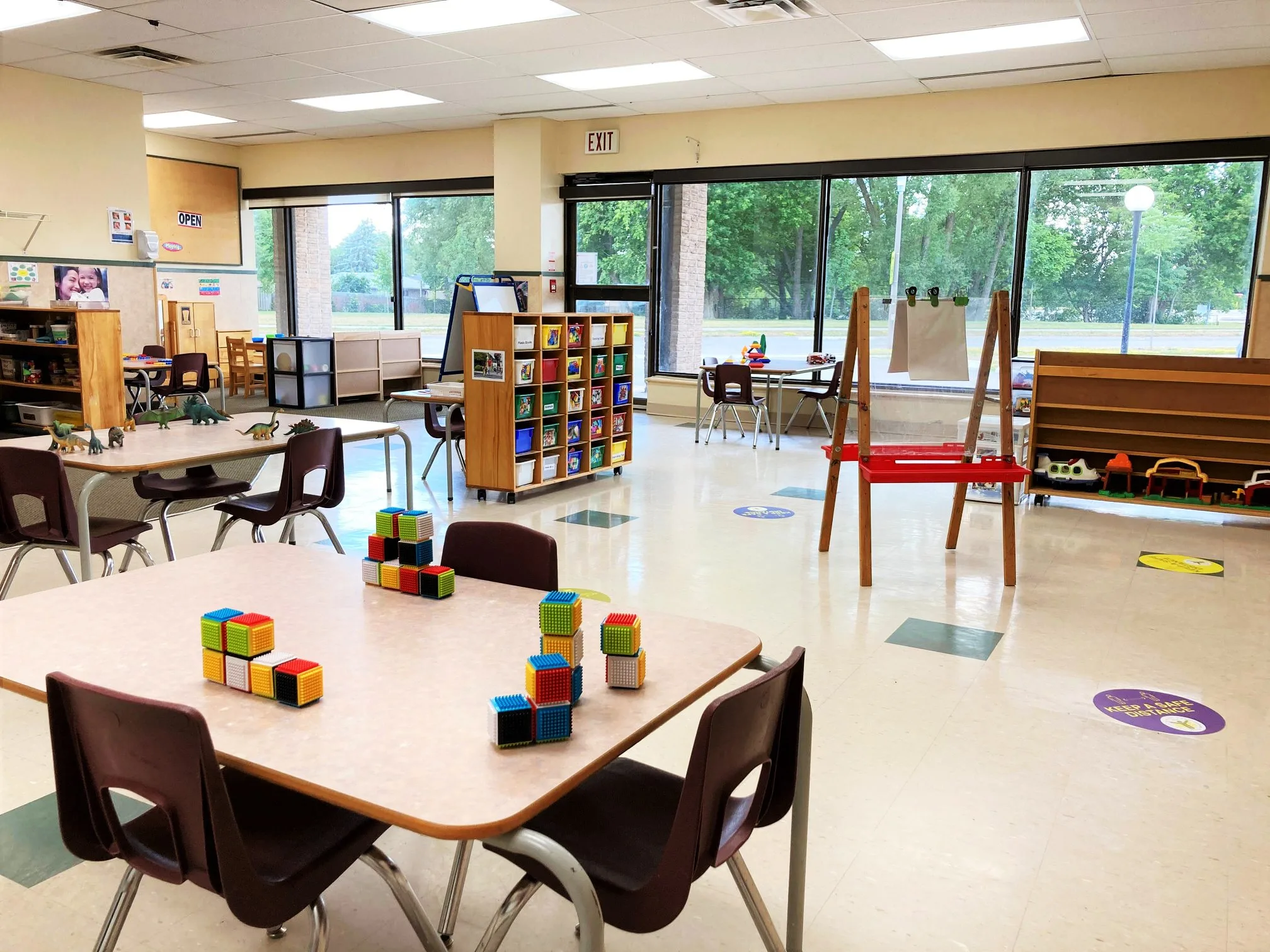 preschool room with tables and chairs