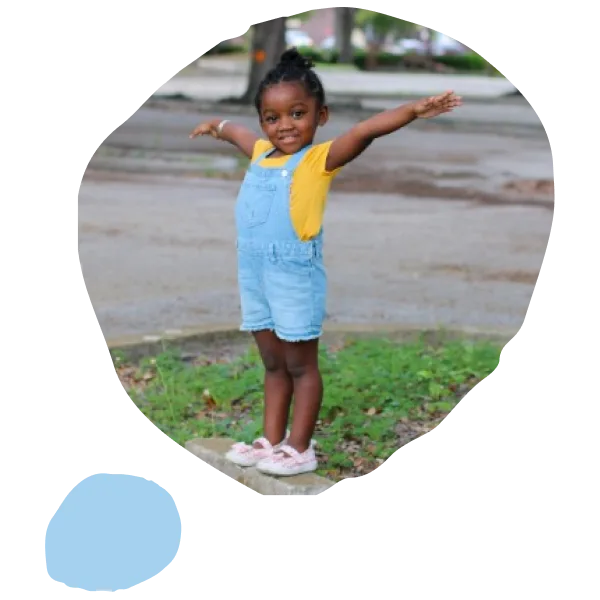 A child holding her arms wide