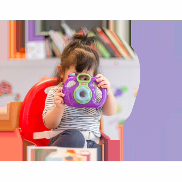 A child looking through a toy